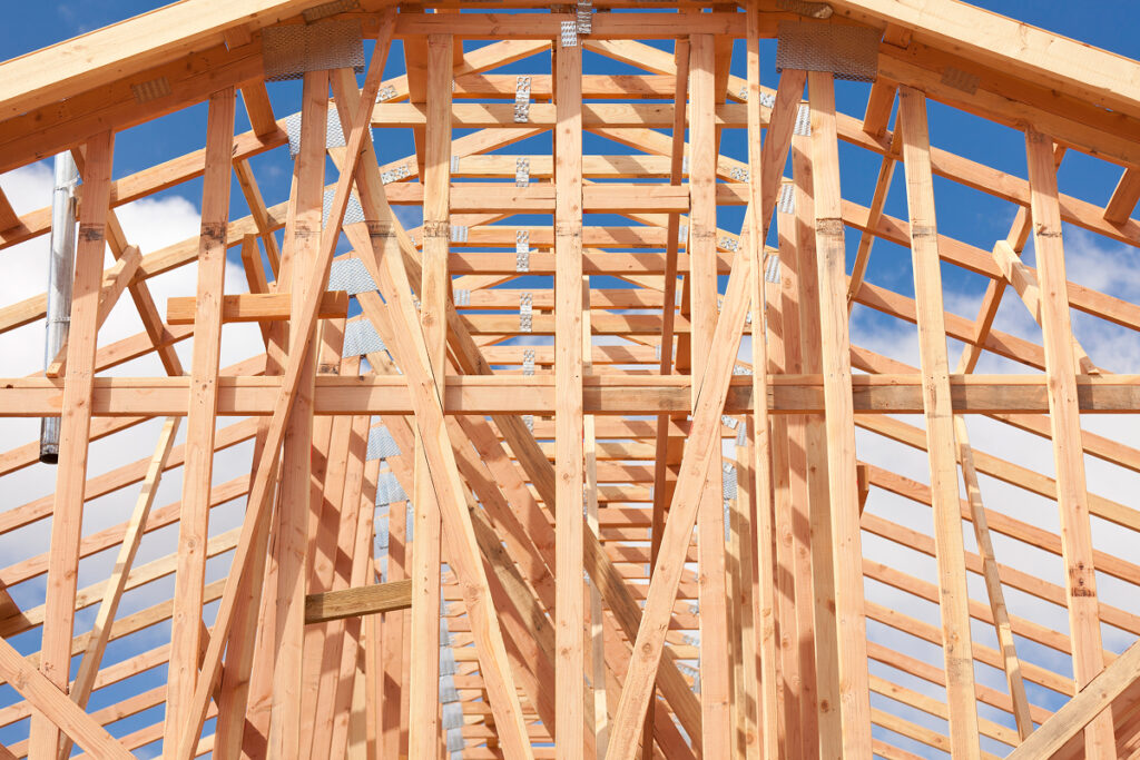 A close up shot of the structural framing of a garage. Northland Building Supplies is ready to build your garage from scratch just the way you want it.
